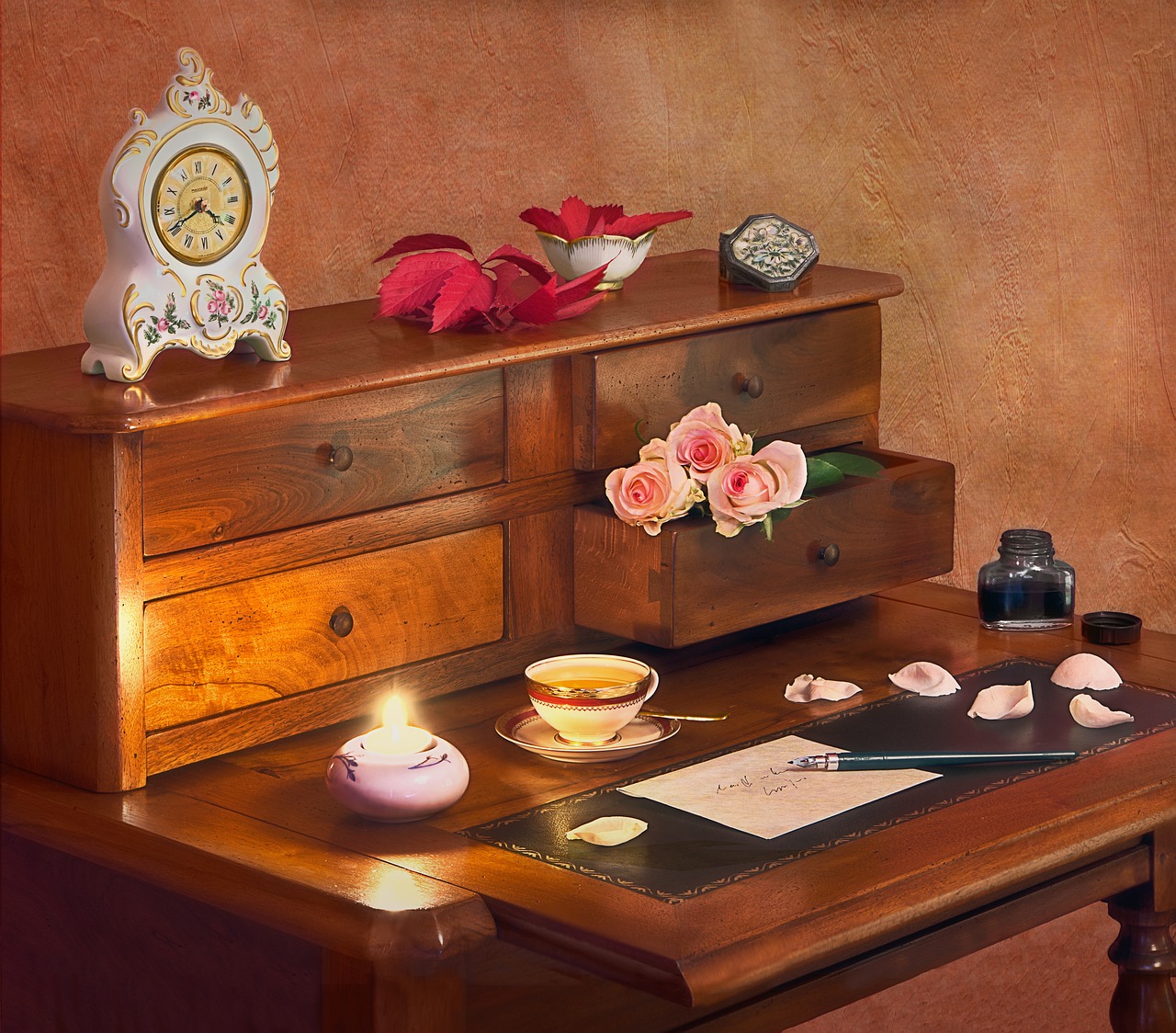 A desk with a letter, pen, and papers
