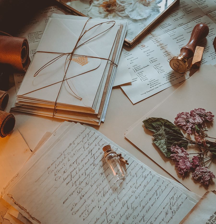 Vintage letters and envelopes tied on a desk